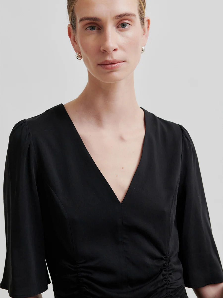 Bluse mit Raffungen und V-Ausschnitt
